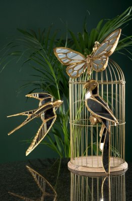 Vacker och elegant spegel formad som en fågel svala. Dekorerad med en guld färgad ram. I vägg modell med fäste på baksidan.  Mät