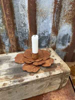 Rostig ljusstake blomma