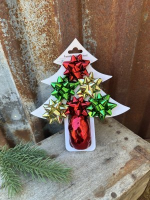 Present kitt jul med snören och rosetter till paket