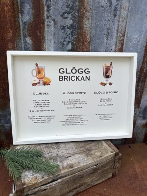 Vit bricka glögg med motiv och text 