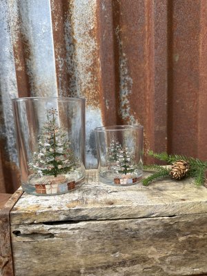 Ljuslykta i glas med julgran