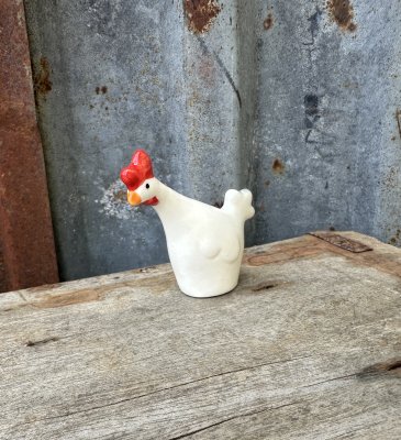 Klassisk vit tupp i porslin