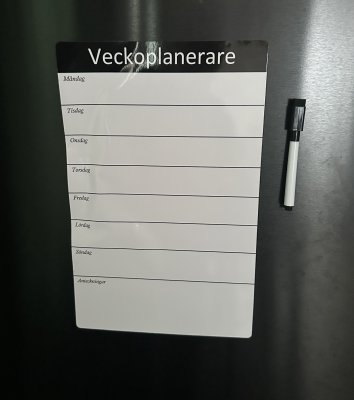 Magnetisk veckoplanerare med penna