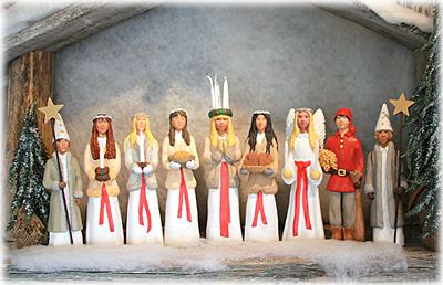 Stor Lucia med ljus i håret av Erkers Marie Persson