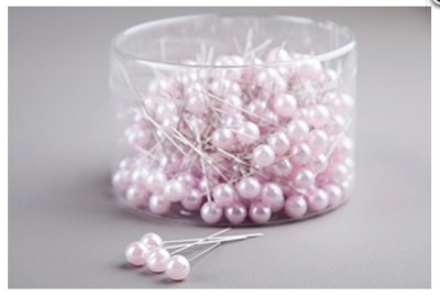 Ljusnål / dekorations nål med rund rosa pärla  upptill, fin att sticka ner i en blommgrupp eller att sätta upp foton med. Finns