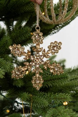 Snöflinga i guld med diamant dekoration