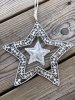 Vackert silver färgat större stjärna i orientalisk stil. Hängande modell med en liten stjärna i mitten på den stora stjärnan. Sn