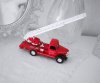 Brandbil /lastbil i gammeldags design. Tillverkad i plåt och plast nostalgi leksaksbil. Med öppningsbara dörrar och i modell d