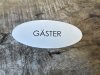 Oval vit skylt GÄSTER i plåt