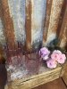 Ljuslykta till lika vas i rosa glas