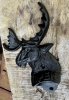 Kapsylöppnare älg i järn