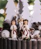 Lucia, stjärngosse och tärna på stick 