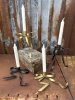 Vacker och elegant rosett ljusstake i metall 