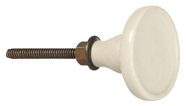 Cream vit keramik knopp med blank glaserad yta. Rund modell med diskret upphöjd kant runt om. Stomme i antik guld färgad nyans.