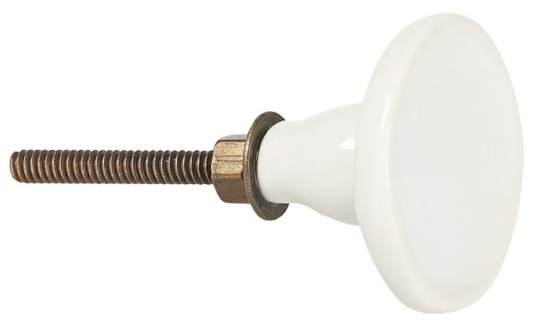 Vit keramik knopp med blank glaserad yta. Rund modell med diskret upphöjd kant runt om. Stomme i antik guld färgad nyans. Från I