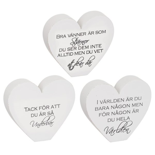 Vitt stående hjärta i trä med fabriksnötta kanter och svart text på en sida . Finns i flera olika text modeller -Glöm ej att