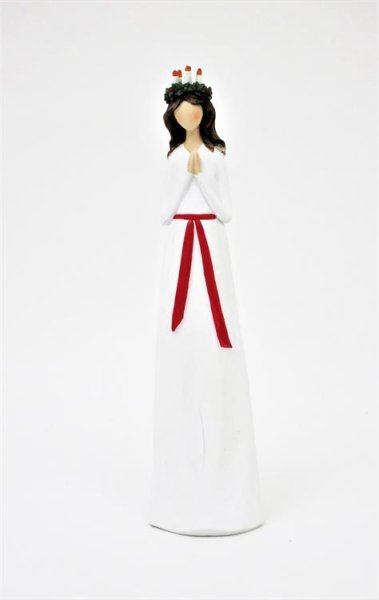 Lucia med ljus i håret. Årets modell från Mitt & Ditt. Vacker och välarbetad figur att dekorera med. Mäter 27*7*6,5cm