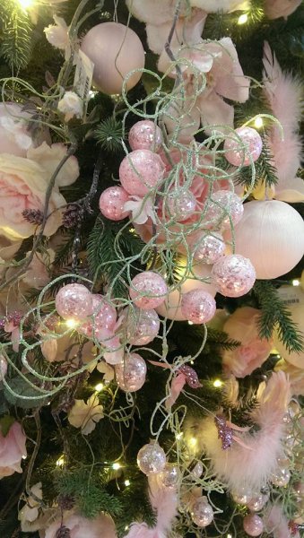 Dekorations girlang med rosa glittrande frost bollar