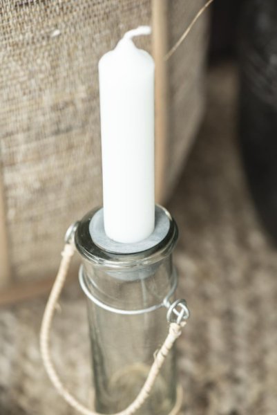 Liten ljushållare i zink. Att sätta i vaser och flaskor som man vill gör om till ljusstake.  Mäter H: 2,1 Ø: 3,5