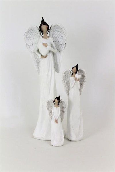 Vacker vit ängel Silje med stora vingar och vitt hjärta . Går i en matt mjuk vit nyans. Finns i tre olika storlekar -Större -Mel