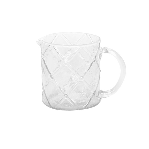 Glaskanna med mönster och handtag