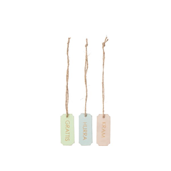 Skylt i pastell med text i guld