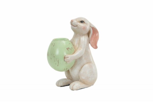 Super söt ljusstake till lika dekoration. Vit hare som håller i ett pastell ägg som är en ljusstake. Finns i två nyanser på ägge