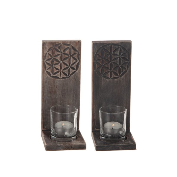 Väggljusstake i trä med vackert mönster och ljusglas. Går i en brun grå natur nyans. Finns i två nyanser. -Ljus -Mörk Med löst