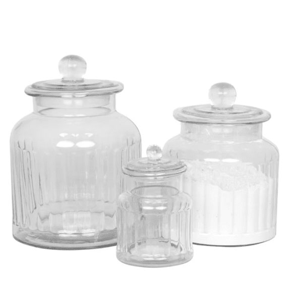 Glasburk med lock och randigt mönster i glas