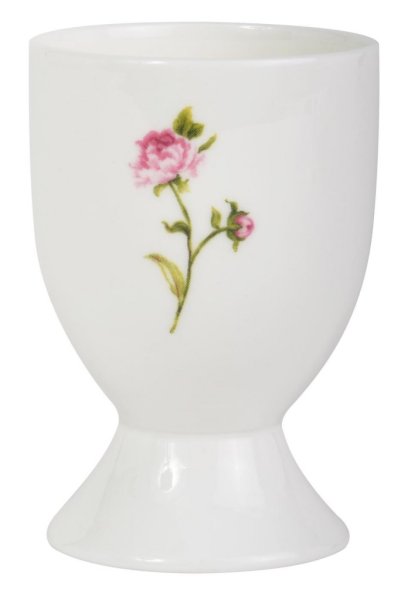 Vit äggkopp i porslin dekorerad med rosor i lantlig romantisk stil. äggkoppen är i klassisk modell med fot nertill. Mäter ca c