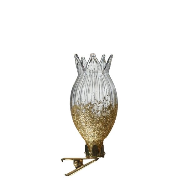 Annorlunda vas i glas. På nypa som man kan fästa på lämpligt och passande ställe. Dekorerad med guld glitter. Finns i två olika