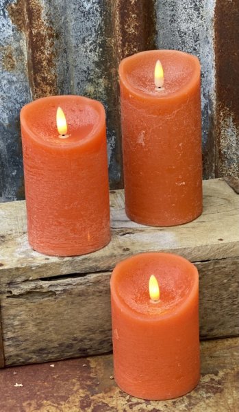 Orangea cylinderformade ljus/led ljus , riktigt vaxljus. Batteri drivna med timer funktion, i två timer lägen. Slå på ljuset tex