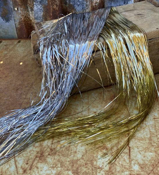 Glitter Lametta i draperi modell. Löst långt glitter att dekorera med tex i julgranen . Glittret sitter fast i överkant och tas