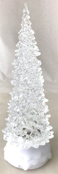 Gran julgran med belysning och vattenfall