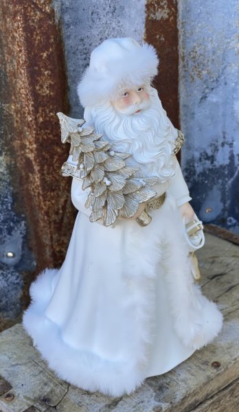 Vacker vit tomte/ jultomte med mjuka guld inslag och vit päls. Detalj full och välarbetad med fina detaljer runt om. Höjd: ca 2