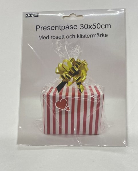 Presentpåse cellofal med rosett och etikett. Färdig presentpåse som passar tex en till presenter godis, ljus mm. Finns i två oli