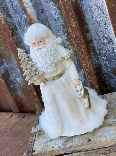 Vacker vit tomte/ jultomte med mjuka guld inslag och vit päls. Detalj full och välarbetad med fina detaljer runt om. Höjd: ca 2
