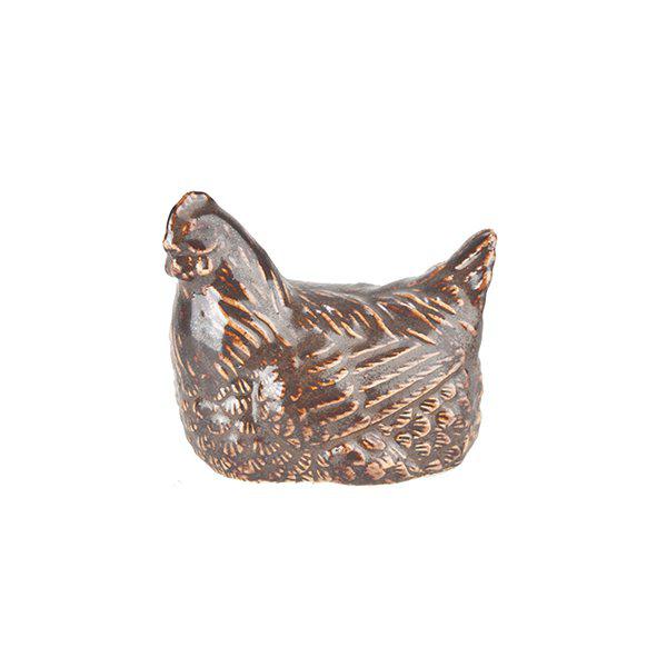 Söt lantlig höna i bruna nyanser. Tillverkad i porslin med fabriks slitna inslag i porslins ytan. En huslig mild och vacker hön