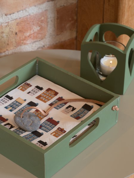 Grönt servettställ med sten