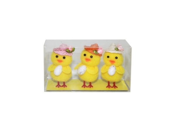 Gula kyckling damer med hatt och ägg