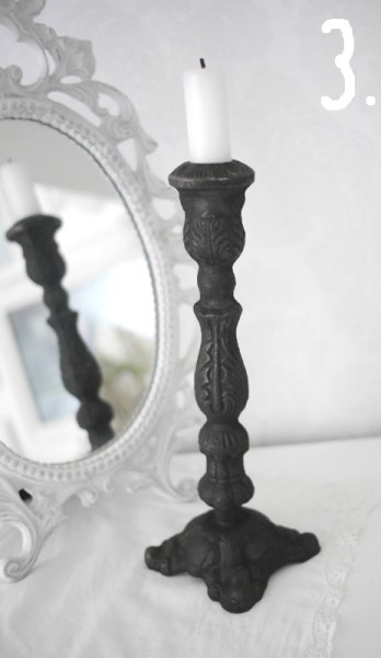 Gammeldags ljustakar i gjutjärn. Tuffa och vackra med grova kontraster fina detaljer och väldekorerade fötter i fransk industris