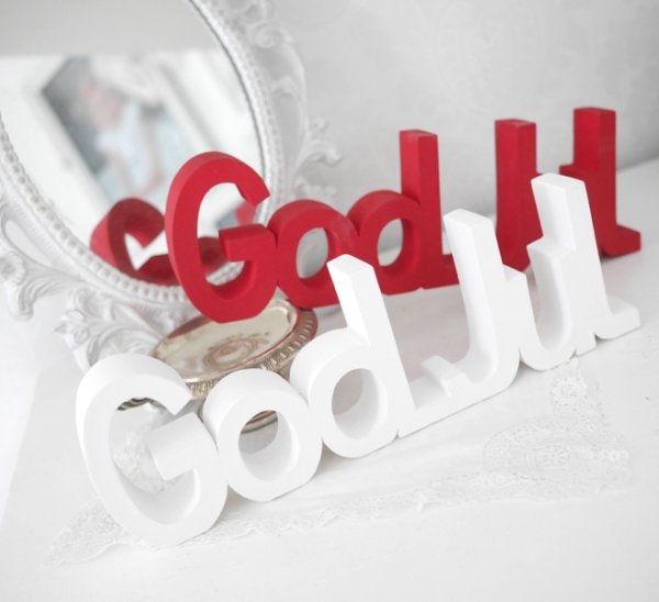 Stående större God Jul ord i skrivstil Den vita Julen