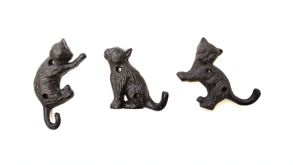 Krok i gjutjärn formad som en katt 