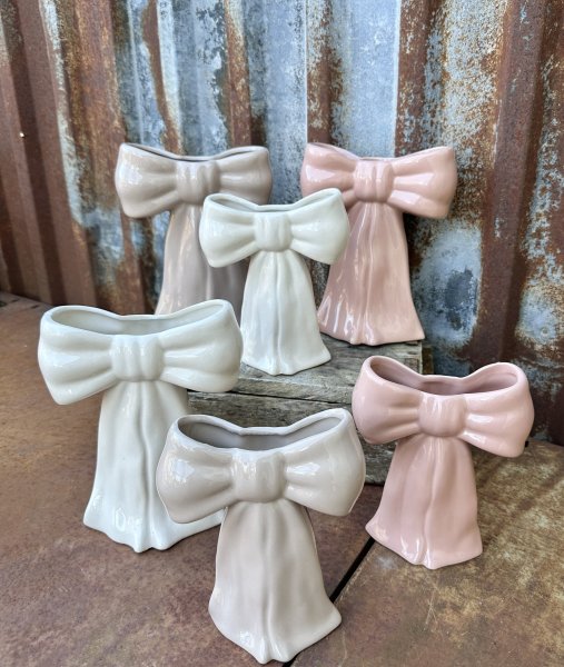 Rosett vas i pastell vacker modell i porslin