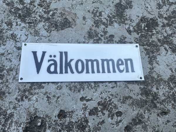 Välkommen skylt