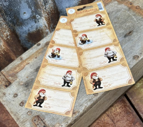 Juletikett till julklappar med tomte 