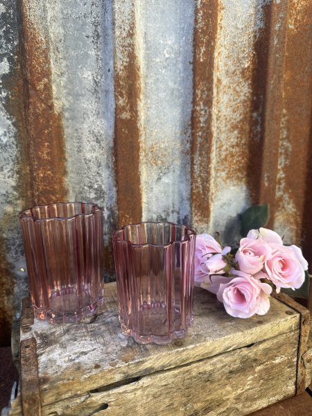 Ljuslykta till lika vas i rosa glas