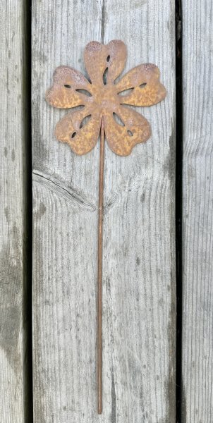 Rostig blomma på stick 