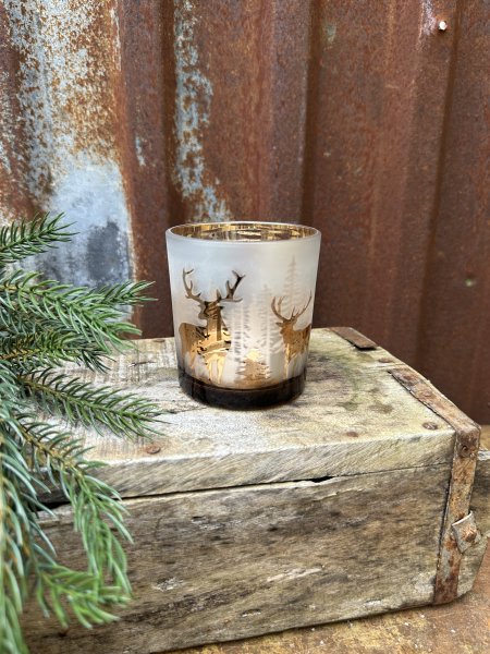 Ljuslykta vildmark med frostad dekor