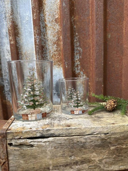 Ljuslykta i glas med julgran